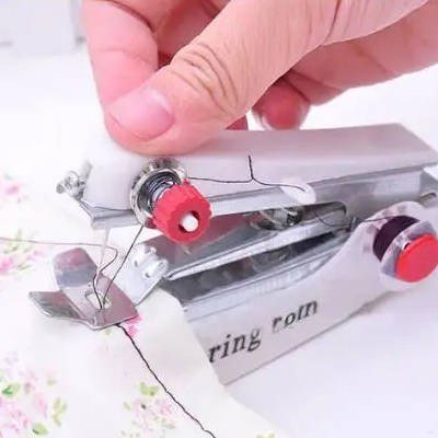 Handheld manual sewing machine